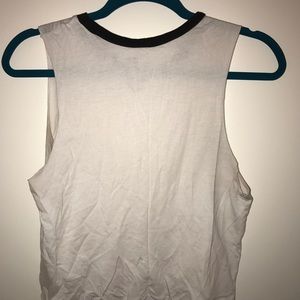 Slightly cropped muscle T